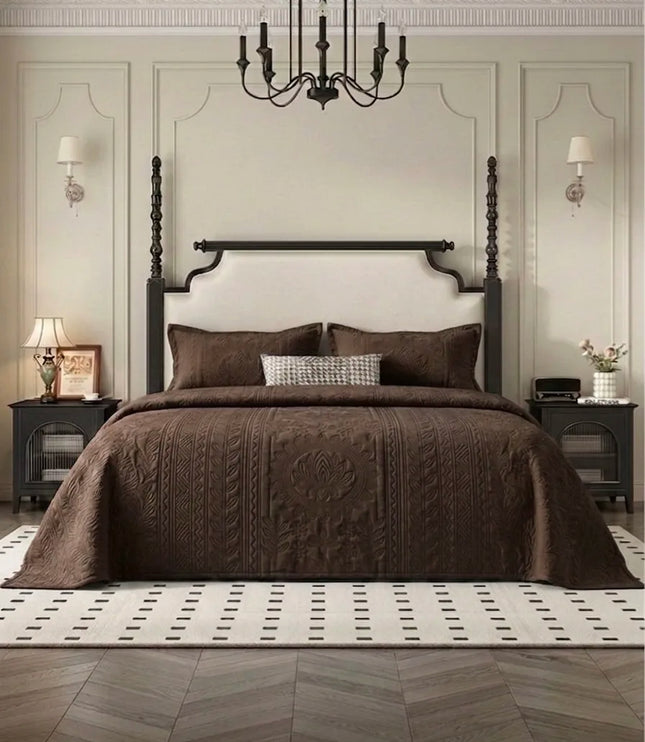 Bedroom with a large bed, dark wood headboard, and decorative elements.