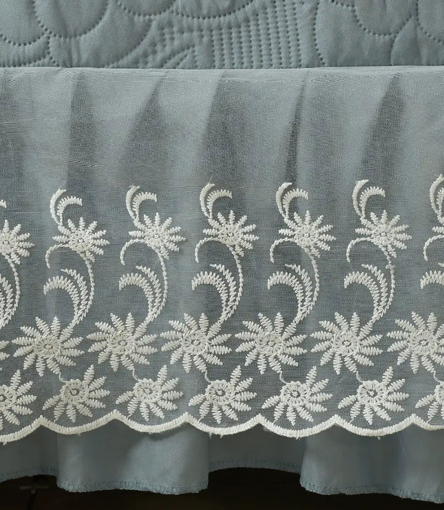 Embroidered lace trim on a fabric background