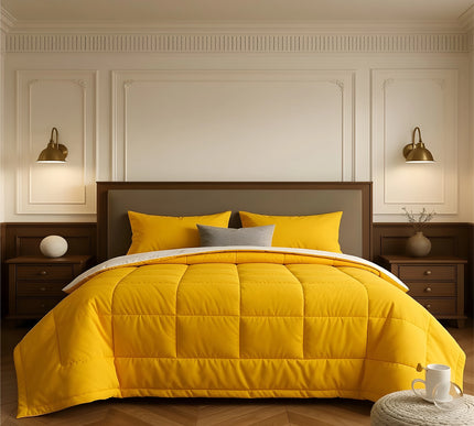 Bedroom with a neatly made bed featuring yellow bedding and wooden furniture.